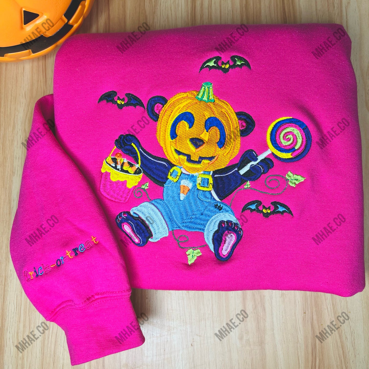 Colorful inspired pumpkin spooky season embroidered sweatshirt, pumpkin head full color trick or treat embroidered design