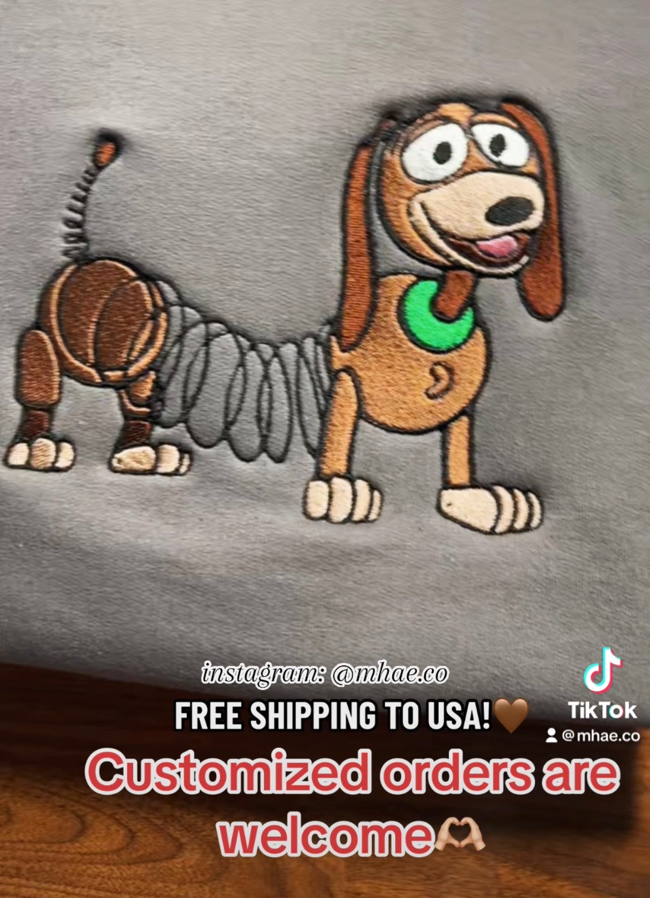 Slinky dog embroidered sweater