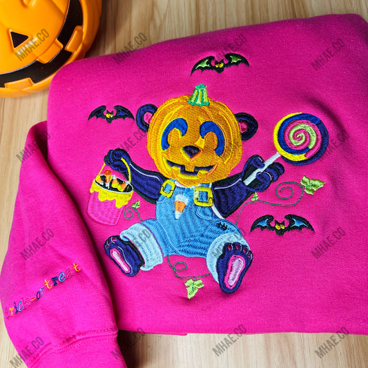 Colorful inspired pumpkin spooky season embroidered sweatshirt, pumpkin head full color trick or treat embroidered design