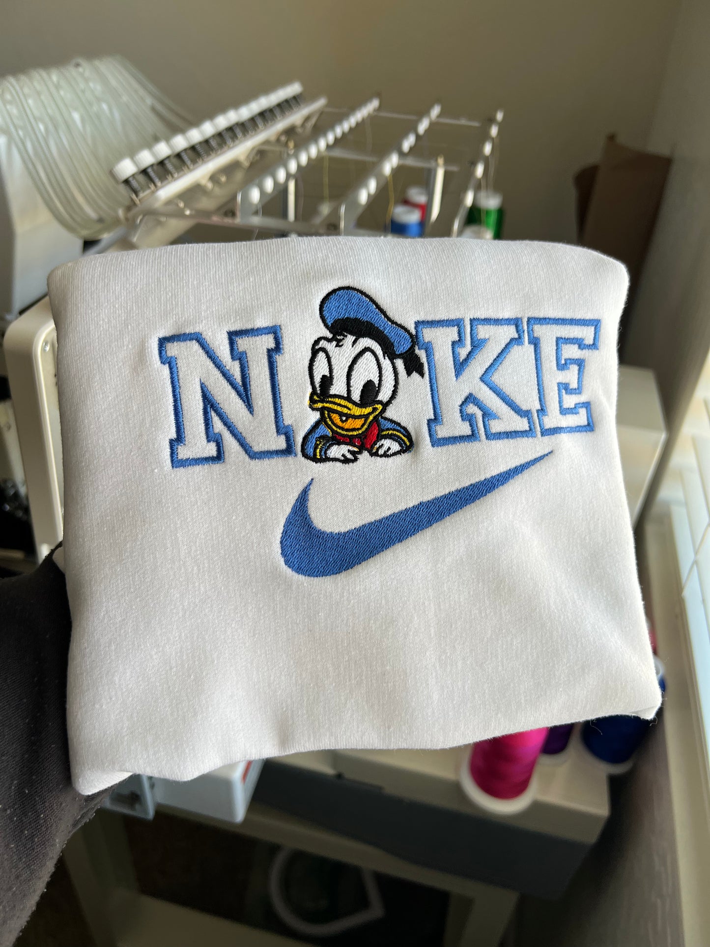 Donald Duck inspired embroidered sweatshirt